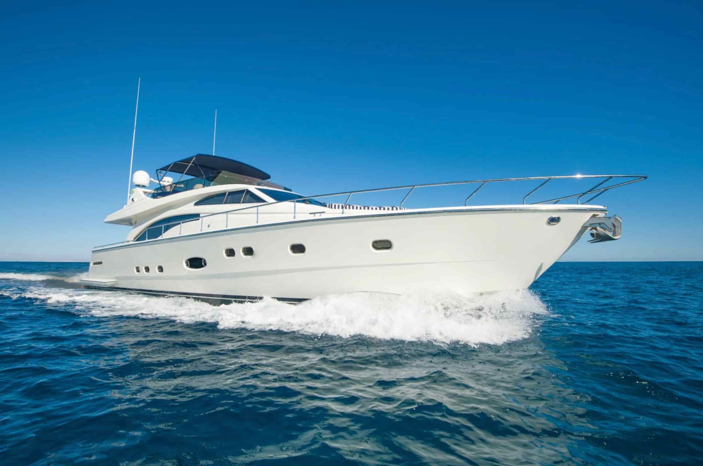 Family enjoying a holiday while driving a boat